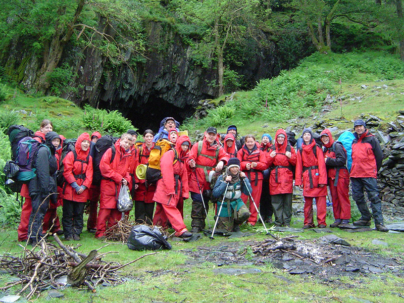 young-people-ready-to-move-off-after-a-night-in-Millican-Dalton's-cave,-Borrowdale